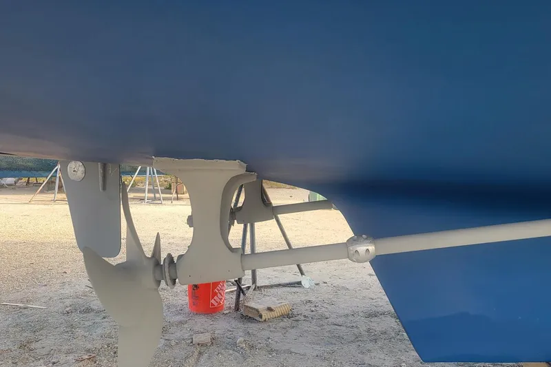 Off Ramp Yacht Photos Pics Novatec Sundeck 2002 boat propeller and rudder in dry dock.