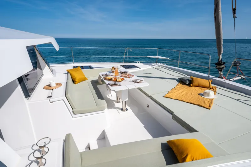  Yacht Photos Pics Luxurious 2026 Bali 4.6 yacht deck with elegant seating and ocean view.