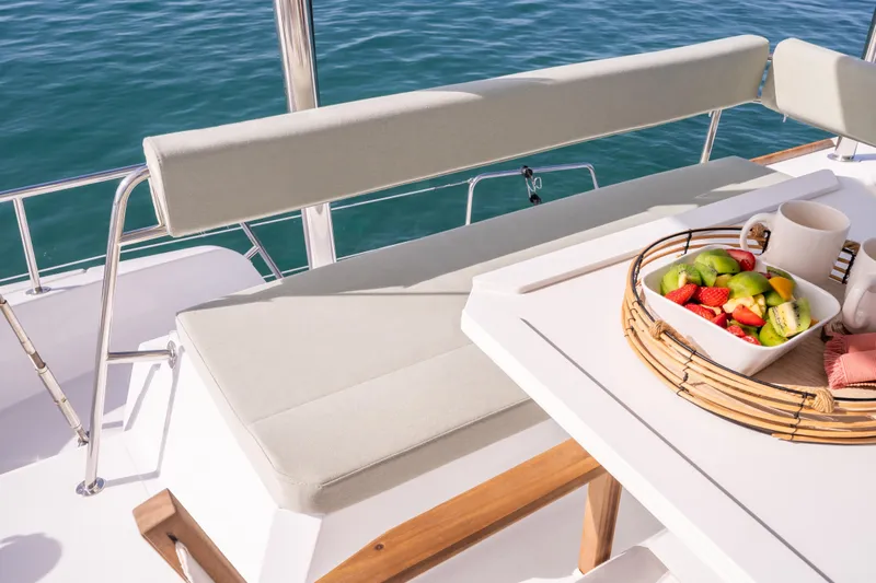  Yacht Photos Pics Luxury Bali 4.6 yacht deck with fruit platter, ocean view, 2026 model.
