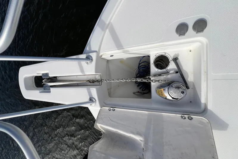 Reel Obsession Yacht Photos Pics Anchor system on 2007 Luhrs 41 Hardtop boat, featuring chain and winch.