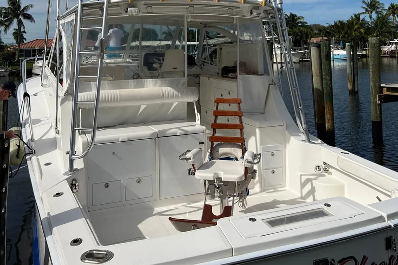 Reel Obsession Yacht Photos Pics 2007 Luhrs 41 Hardtop boat with spacious deck and fishing chair.