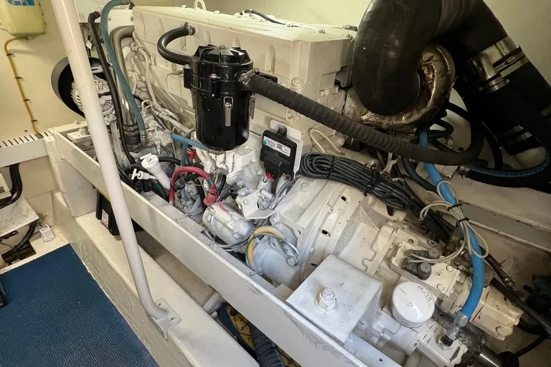 Reel Obsession Yacht Photos Pics Engine room of 2007 Luhrs 41 Hardtop boat, showcasing detailed mechanical components.