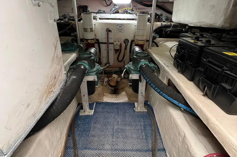 Reel Obsession Yacht Photos Pics Engine room of 2007 Luhrs 41 Hardtop boat with visible machinery and components.