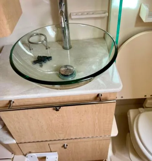 Sea SeÑor Yacht Photos Pics Glass sink and faucet in 2017 Boston Whaler 370 Outrage boat bathroom.