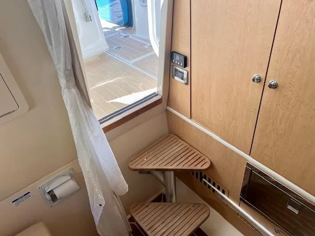 Sea SeÑor Yacht Photos Pics Interior of 2017 Boston Whaler 370 Outrage, featuring wooden steps and cabinetry.