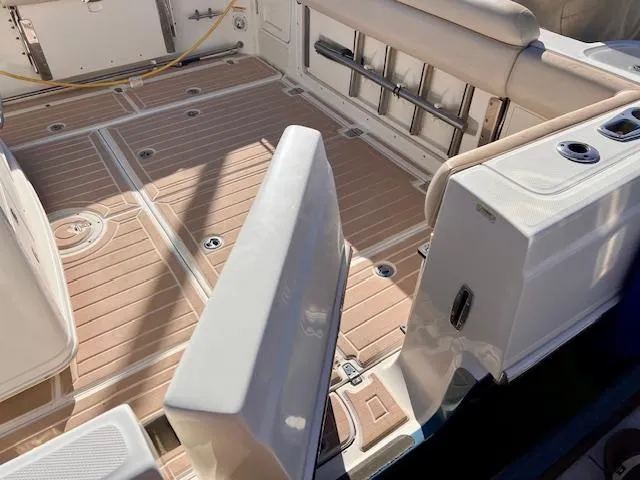 Sea SeÑor Yacht Photos Pics 2017 Boston Whaler 370 Outrage boat deck with seating and rod holders.