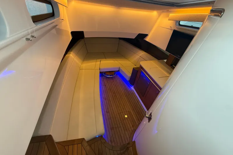  Yacht Photos Pics Luxurious interior of 2020 Boston Whaler 420 Outrage with ambient lighting and seating.