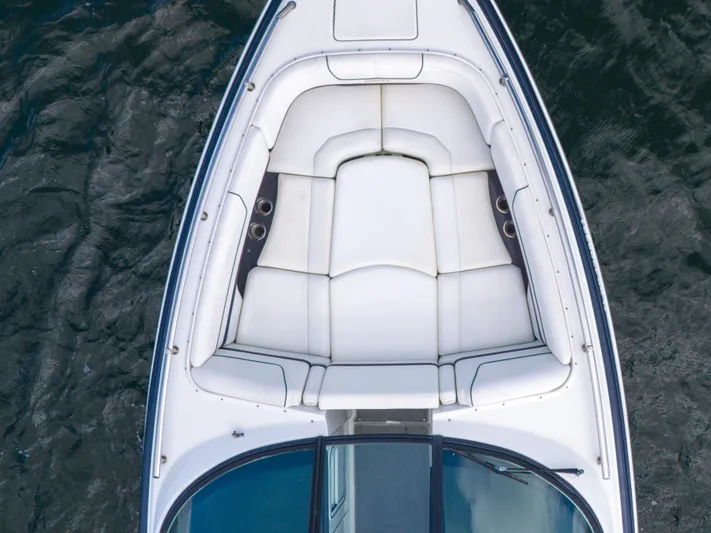 Without A Kaire Yacht Photos Pics 2020 Formula 310 Bowrider boat with spacious white seating on water.