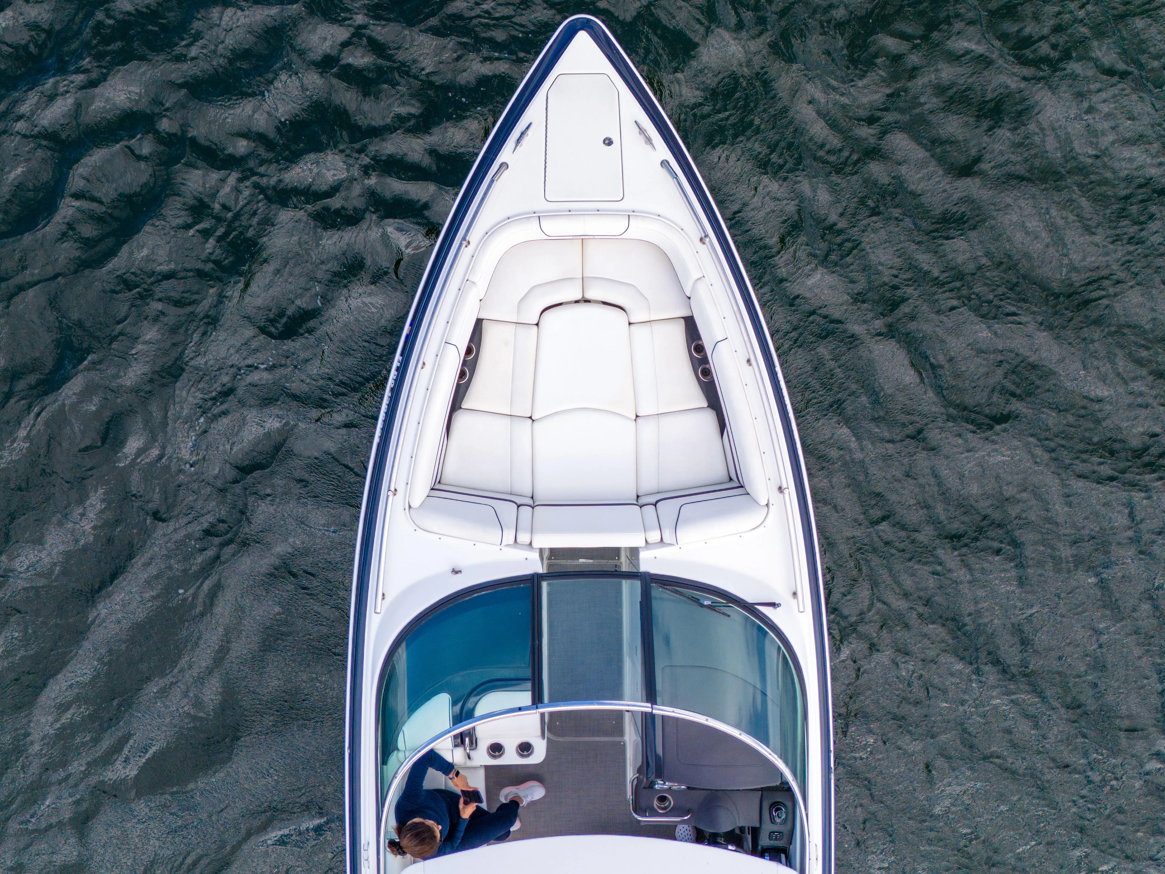 Without A Kaire Yacht Photos Pics 2020 Formula 310 Bowrider on water, aerial view showcasing sleek design and spacious seating.