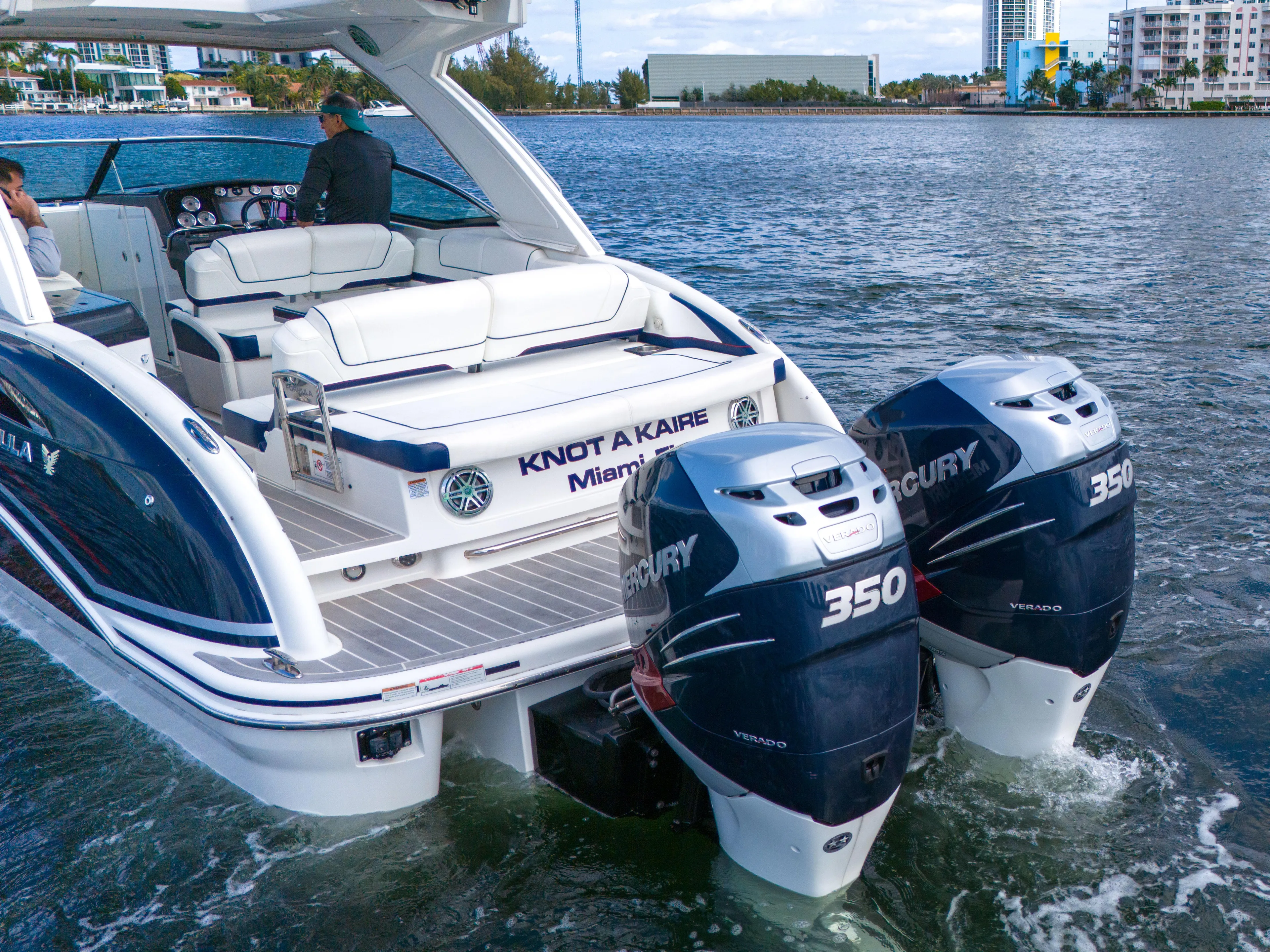 Without A Kaire Yacht Photos Pics 2020 Formula 310 Bowrider with twin Mercury 350 engines cruising on water.