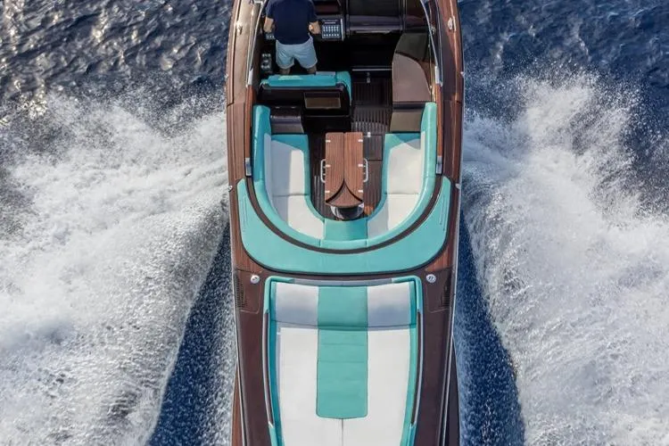 Anniversario No. 7 Of 18 Yacht Photos Pics 2024 Riva Anniversario luxury yacht cruising on open water, top view.