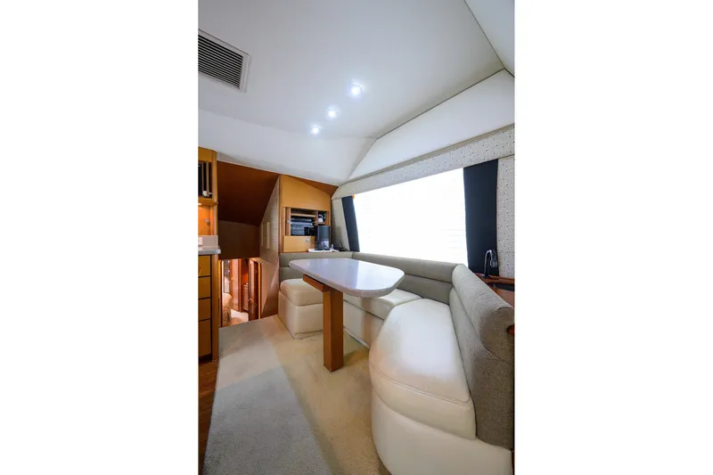 Members Only Yacht Photos Pics Luxurious interior of 2001 Ocean Yachts Super Sport with elegant seating and dining area.