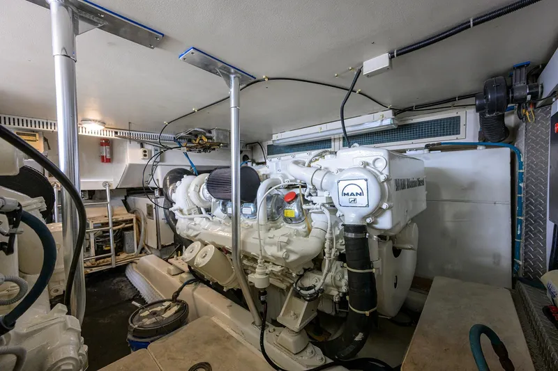 Members Only Yacht Photos Pics Engine room of 2001 Ocean Yachts Super Sport, featuring MAN diesel engine.