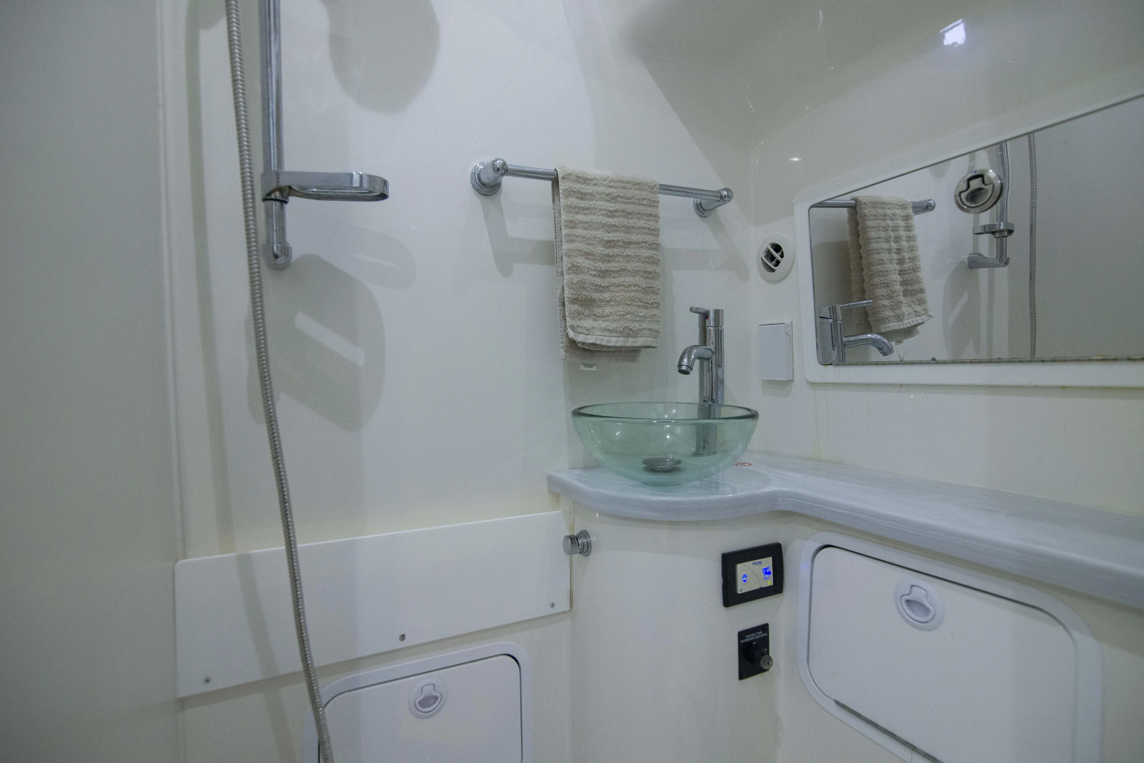 Miss Megan Yacht Photos Pics Modern bathroom in 2021 Regulator 41 boat with glass sink and shower.
