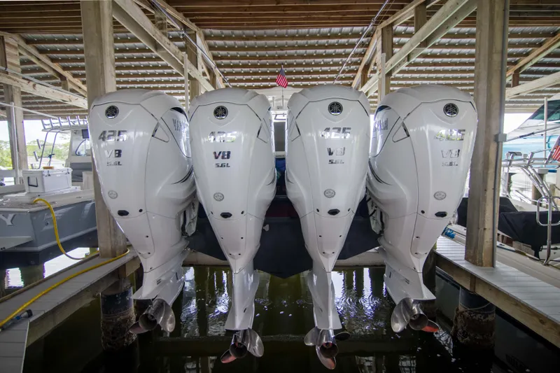 Miss Megan Yacht Photos Pics Four Yamaha 425 V8 outboard engines on a 2021 Regulator 41 boat in a marina.