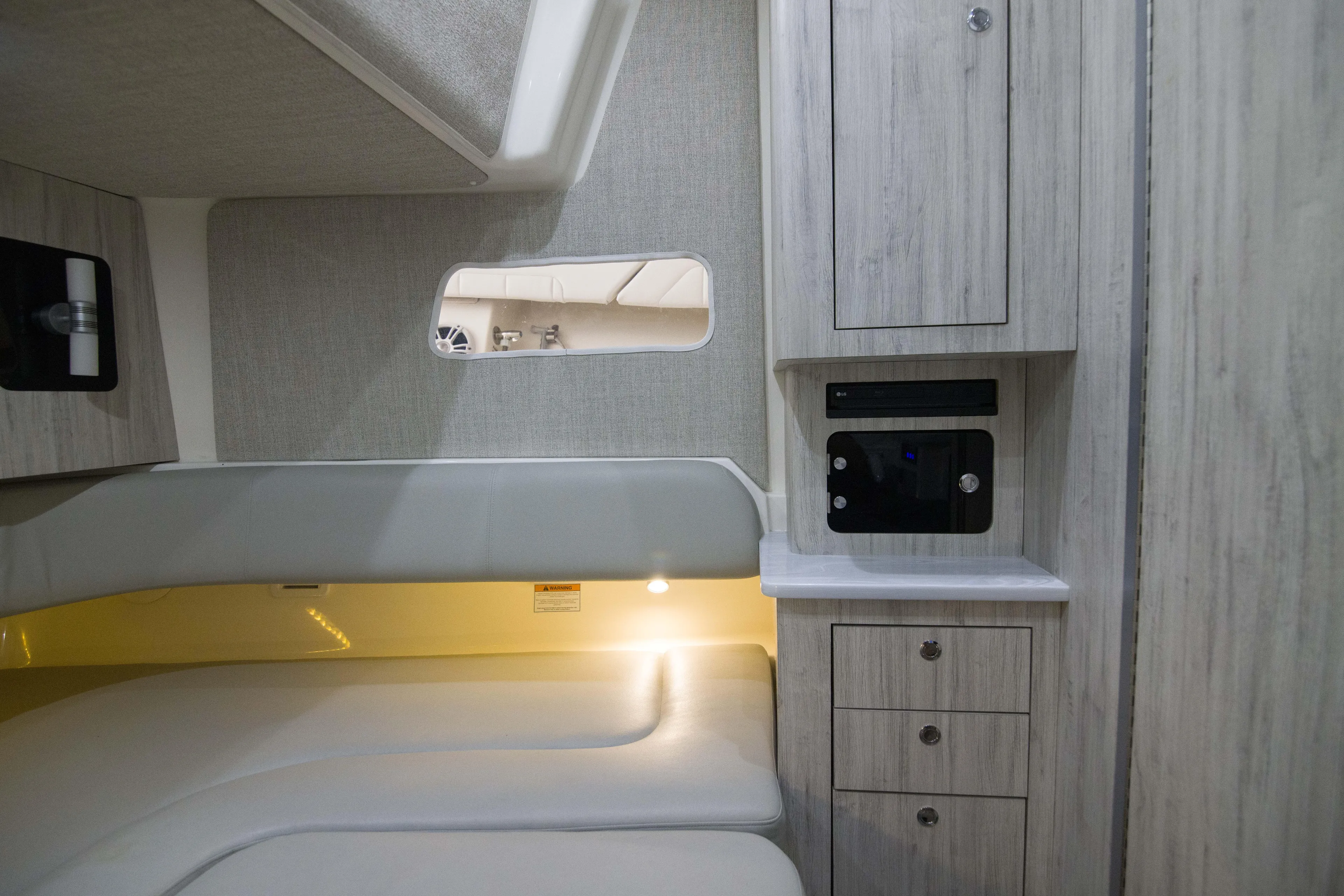 Miss Megan Yacht Photos Pics 2021 Regulator 41 cabin interior with modern wood finish and built-in storage.