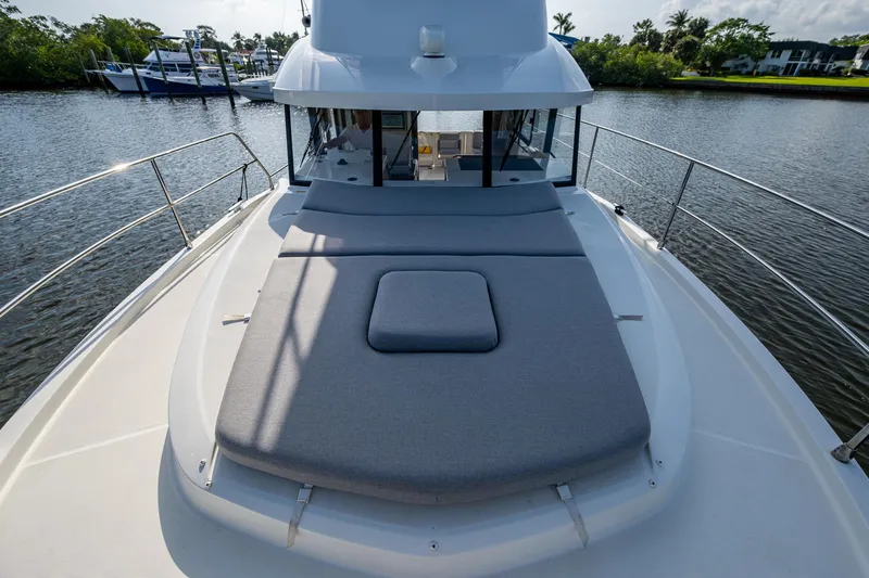 Ashokan Yacht Photos Pics 2022 Beneteau Swift Trawler 35, spacious deck view, moored on a calm river.
