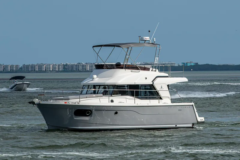 Ashokan Yacht Photos Pics 2022 Beneteau Swift Trawler 35 cruising on open water.