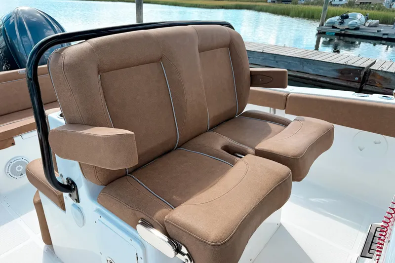  Yacht Photos Pics 2023 Sea Hunt Ultra 275 SE boat with comfortable brown seating.