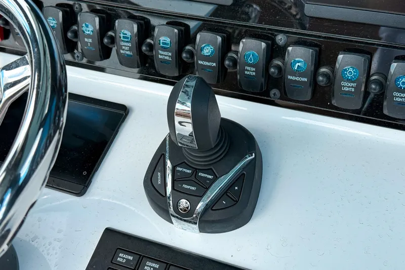  Yacht Photos Pics Control panel of 2023 Sea Hunt Ultra 275 SE boat with joystick and switches.