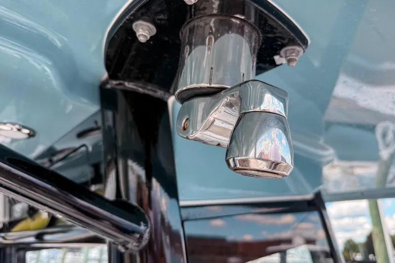  Yacht Photos Pics Close-up of a 2023 Sea Hunt Ultra 275 SE boat's chrome fixture detail.