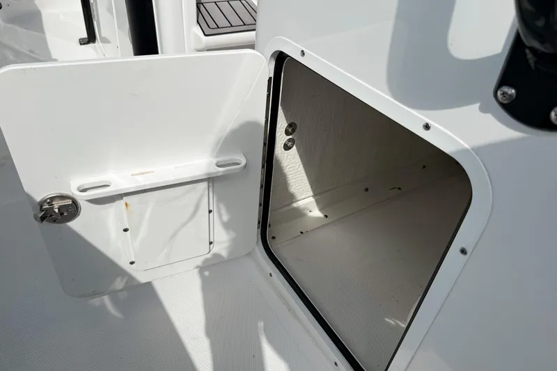  Yacht Photos Pics Open storage compartment on 2023 Sea Hunt Ultra 275 SE boat.