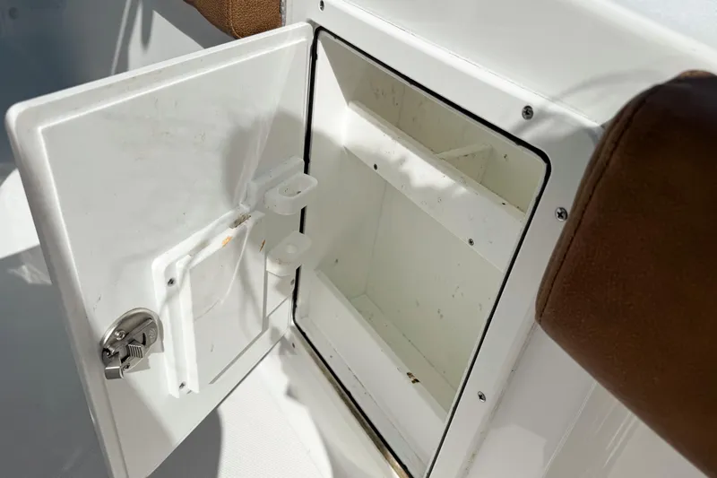  Yacht Photos Pics Open storage compartment on 2023 Sea Hunt Ultra 275 SE boat.