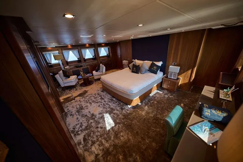  Yacht Photos Pics Luxurious Sunseeker 131 Yacht bedroom with elegant furnishings and ambient lighting, 2010 model.