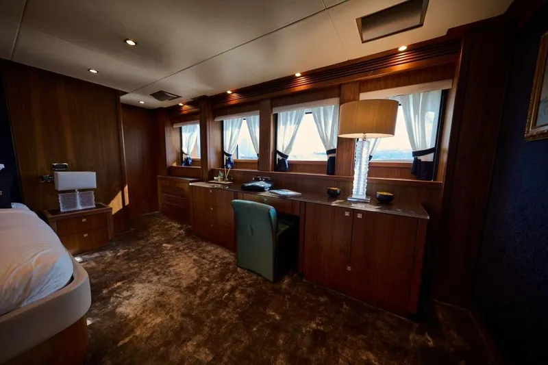  Yacht Photos Pics Luxurious interior of 2010 Sunseeker 131 Yacht with elegant wood paneling and plush carpet.