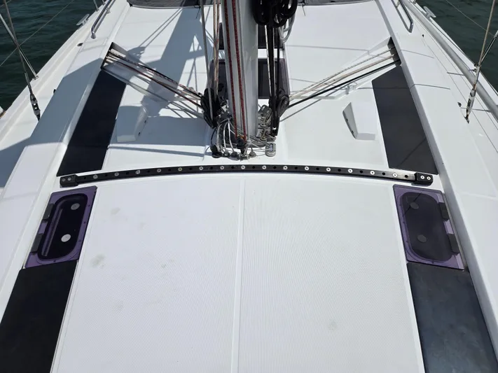 Off-piste Yacht Photos Pics Deck of 2019 Beneteau Oceanis 46.1 sailboat with rigging and hatches.