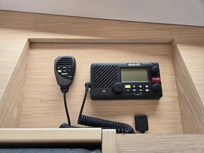 Off-piste Yacht Photos Pics B&G V50 marine radio on 2019 Beneteau Oceanis 46.1 yacht, featuring distress button.