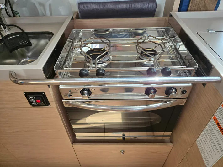 Off-piste Yacht Photos Pics Modern kitchen stove in 2019 Beneteau Oceanis 46.1 yacht galley.