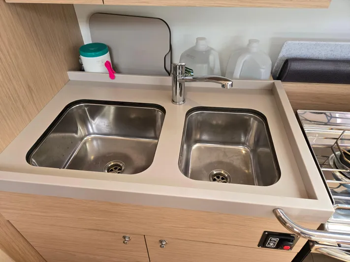 Off-piste Yacht Photos Pics Dual sink in 2019 Beneteau Oceanis 46.1 yacht kitchen galley.