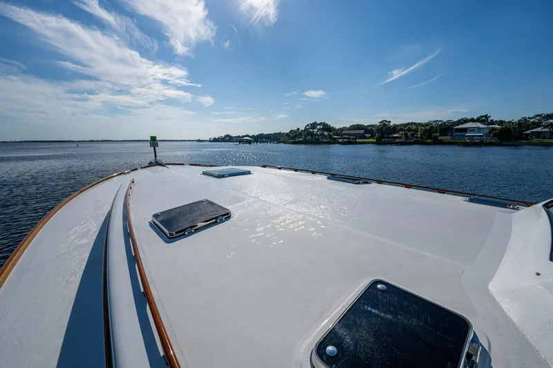 Oldielox 2 Yacht Photos Pics 2019 Hinckley T55 MKII Motor Yacht deck with scenic water view.