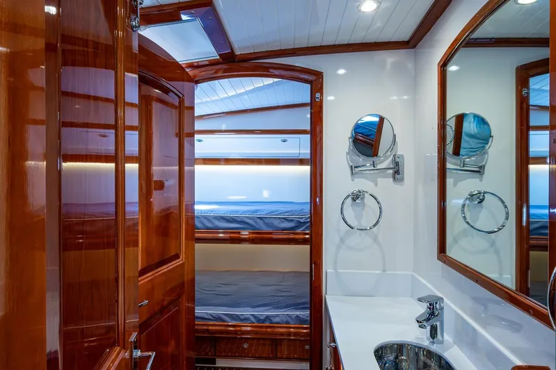 Oldielox 2 Yacht Photos Pics Luxurious 2019 Hinckley T55 MKII Motor Yacht interior with elegant wood finish and modern amenities.
