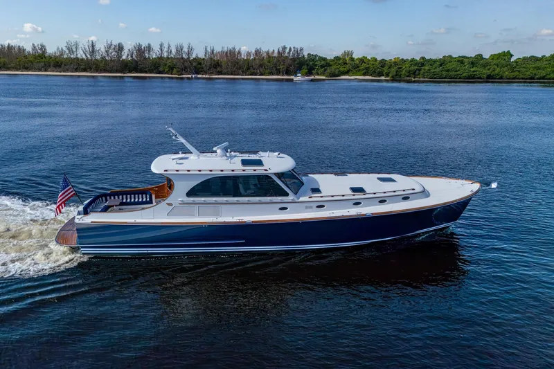 Oldielox 2 Yacht Photos Pics 2019 Hinckley T55 MKII Motor Yacht cruising on calm waters.