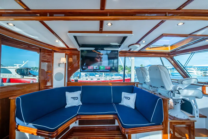 Oldielox 2 Yacht Photos Pics Luxurious interior of 2019 Hinckley T55 MKII Motor Yacht with plush seating and modern amenities.