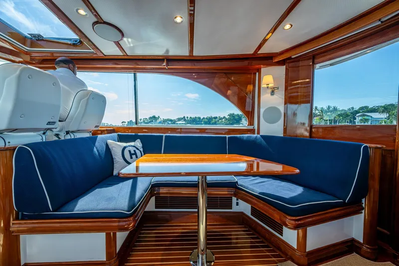 Oldielox 2 Yacht Photos Pics Luxurious interior of 2019 Hinckley T55 MKII Motor Yacht with elegant seating and wooden finishes.