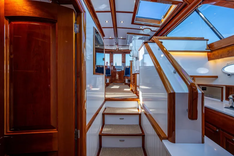 Oldielox 2 Yacht Photos Pics Luxurious interior of 2019 Hinckley T55 MKII Motor Yacht with elegant wood finishes.