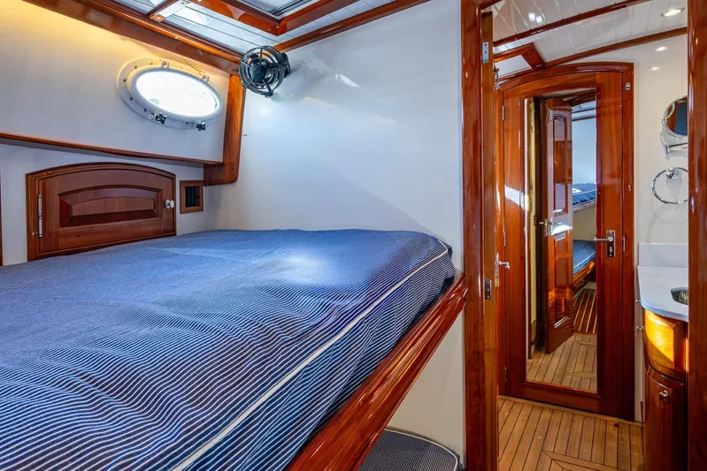 Oldielox 2 Yacht Photos Pics Luxurious cabin interior of 2019 Hinckley T55 MKII Motor Yacht with wooden finishes.