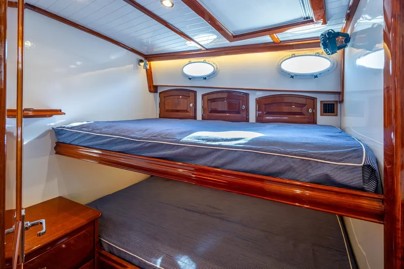 Oldielox 2 Yacht Photos Pics Luxurious cabin interior of 2019 Hinckley T55 MKII Motor Yacht with wooden finishes.