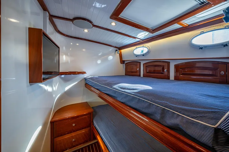 Oldielox 2 Yacht Photos Pics Luxurious cabin interior of 2019 Hinckley T55 MKII Motor Yacht with wood accents.