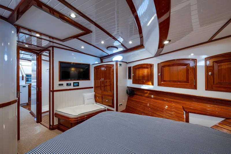 Oldielox 2 Yacht Photos Pics Luxurious interior of 2019 Hinckley T55 MKII Motor Yacht with wood finishes and modern amenities.