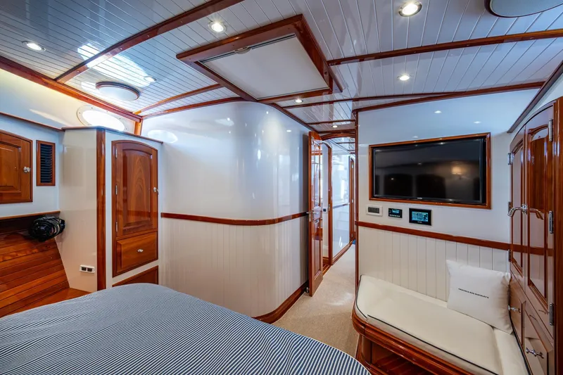 Oldielox 2 Yacht Photos Pics Luxurious interior of 2019 Hinckley T55 MKII Motor Yacht with wood accents and modern amenities.