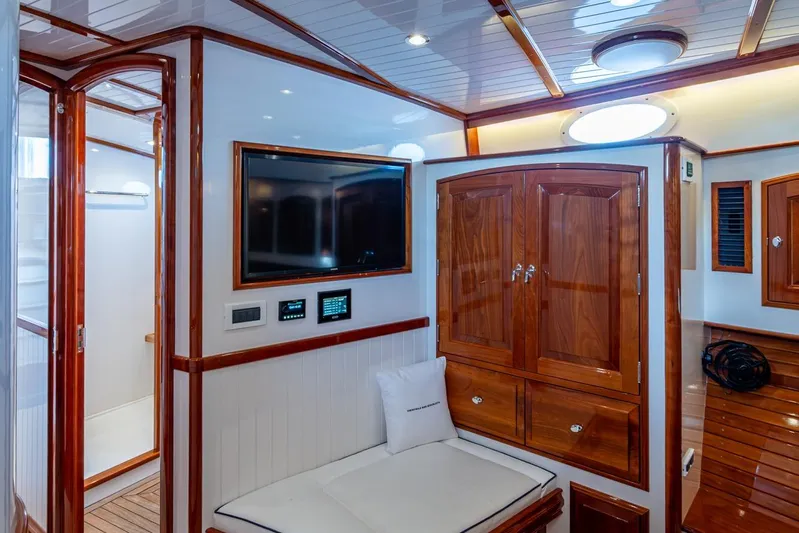 Oldielox 2 Yacht Photos Pics Luxurious interior of 2019 Hinckley T55 MKII Motor Yacht with wood finishes and modern amenities.