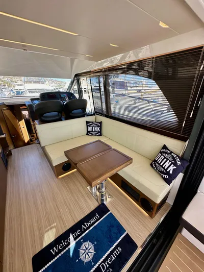  Yacht Photos Pics Luxurious interior of 2024 Bavaria R40 yacht with elegant seating and nautical decor.