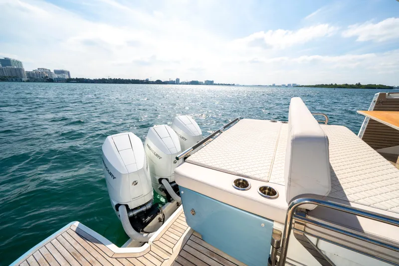  Yacht Photos Pics 2024 Jeanneau DB/43 OB boat with triple Mercury outboard engines on a sunny day.