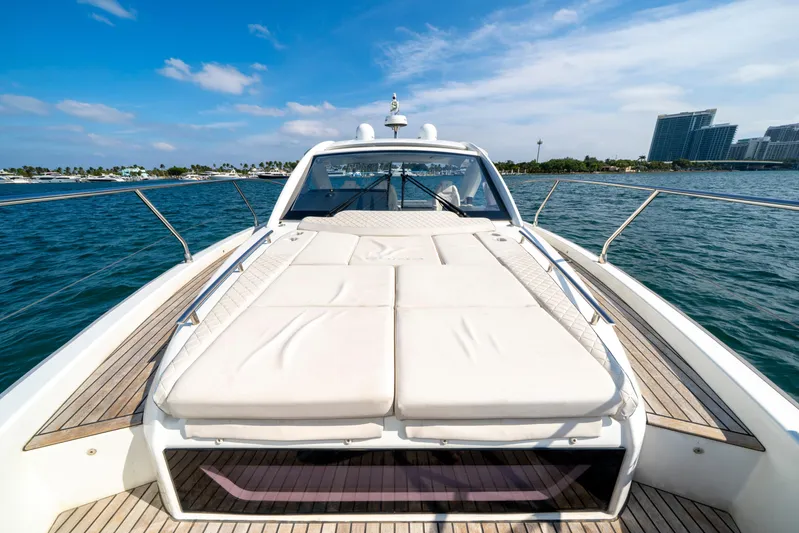  Yacht Photos Pics 2024 Jeanneau DB/43 OB yacht with spacious deck and luxurious seating on open water.