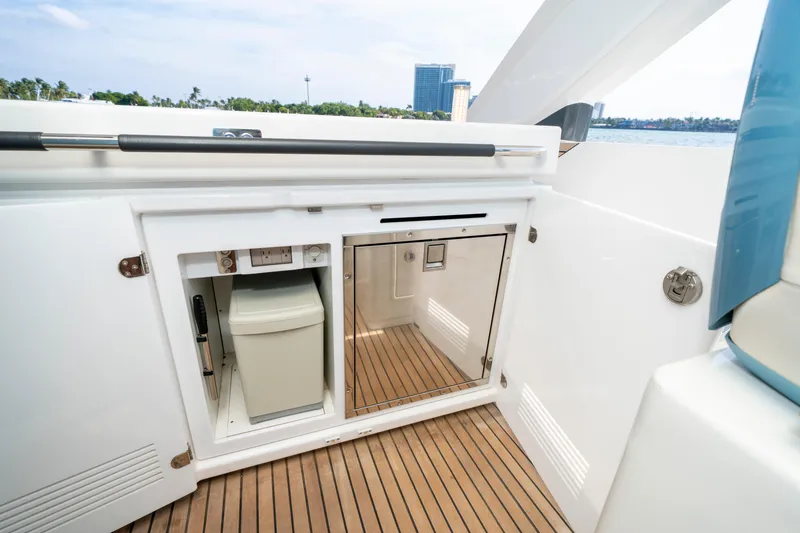  Yacht Photos Pics 2024 Jeanneau DB/43 OB yacht interior with storage and sleek design.