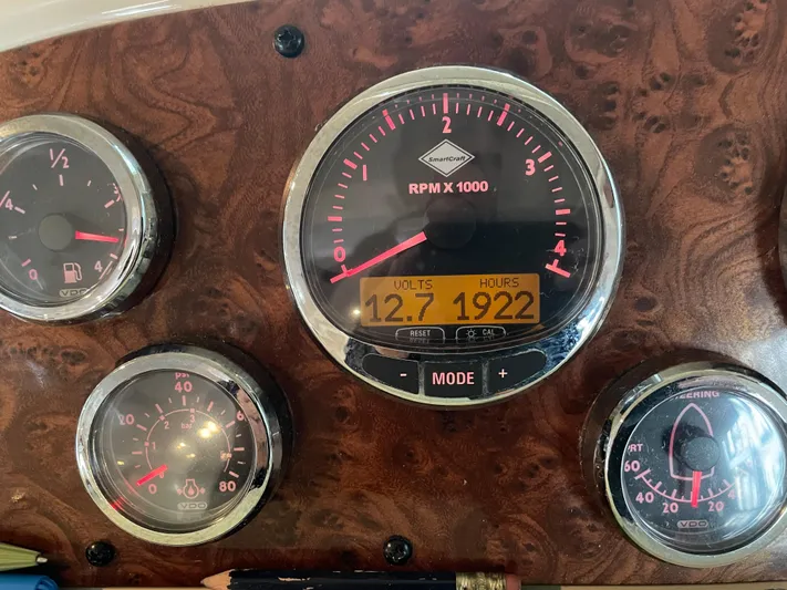 Seaduced Yacht Photos Pics Dashboard of a 2006 Meridian 341 Sedan showing RPM, voltage, and engine hours.